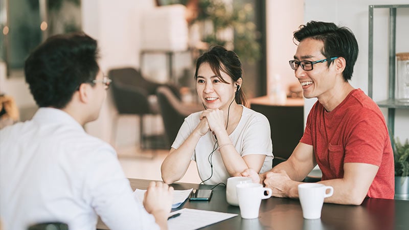 couple speaking with a consultant